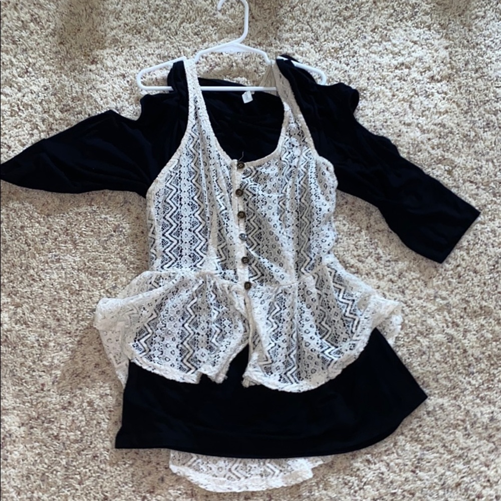 This is a long sleeve black top.